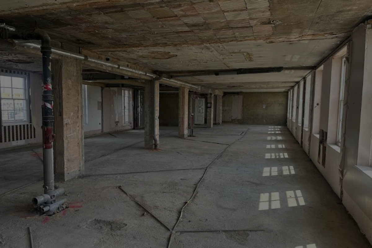 Retail property interior undergoing asbestos refurbishment survey as part of portfolio programme